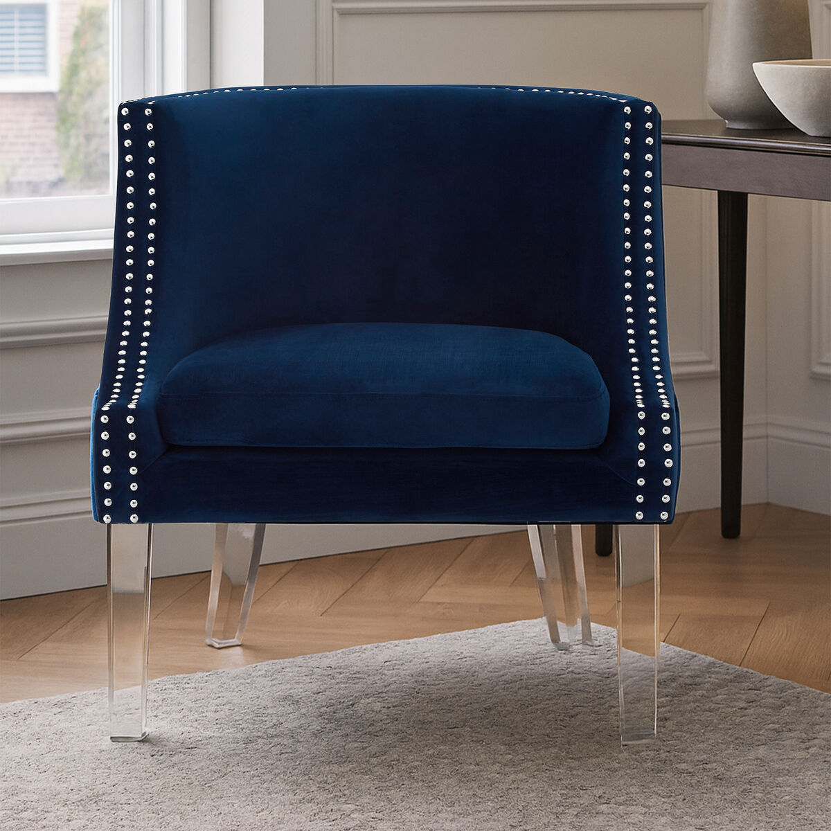 Orsina Velvet Chair in Navy Blue with Elegant Studded Detailing and Clear Acrylic Legs