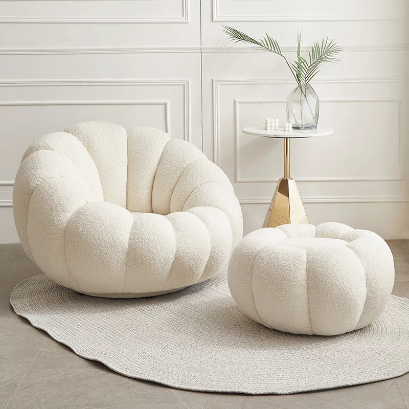 Nisu Home plush chair in white, featuring a cozy design and round shape for modern living spaces