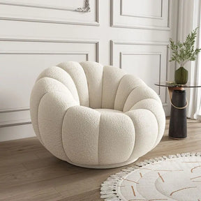 Stylish Nisu Home chair in cream upholstery, featuring a round cushioned design for comfort