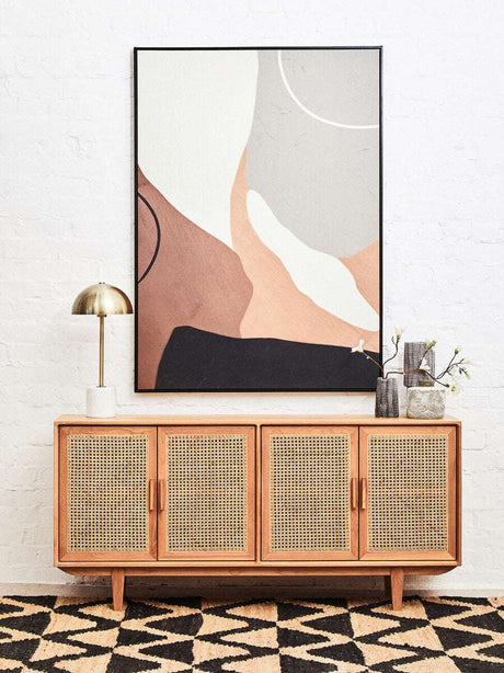 Orsina Hemp Rug featuring a geometric pattern, styled with modern decor in a chic living space