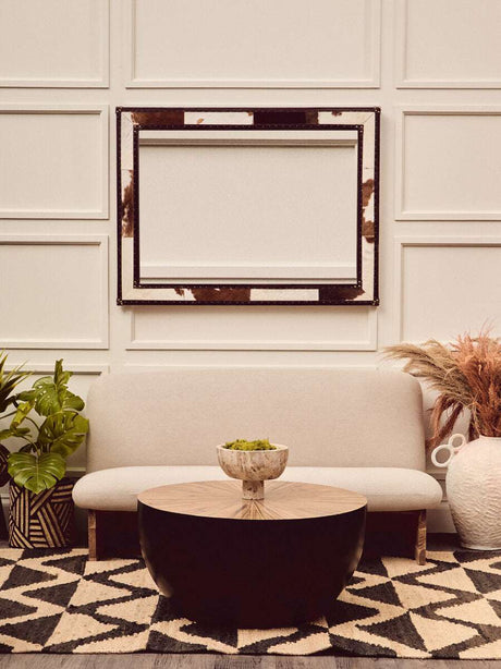 Stylish Orsina Hemp Rug with geometric patterns, complementing a modern living room setup