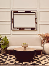 Stylish Orsina Hemp Rug with geometric patterns, complementing a modern living room setup