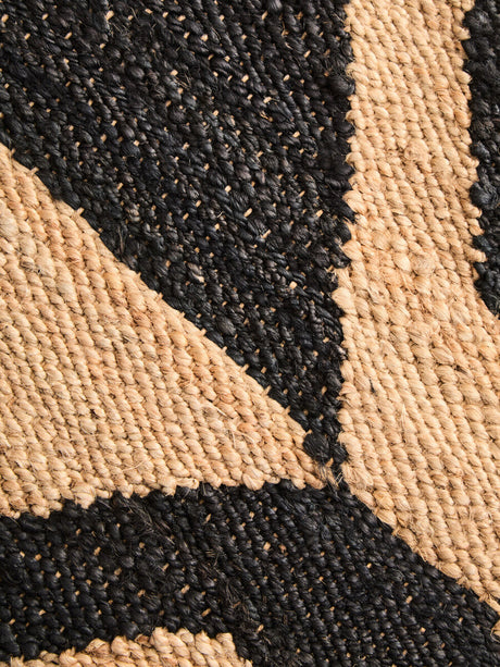 Orsina Hemp Rug with intricate black and natural woven patterns for stylish home decor