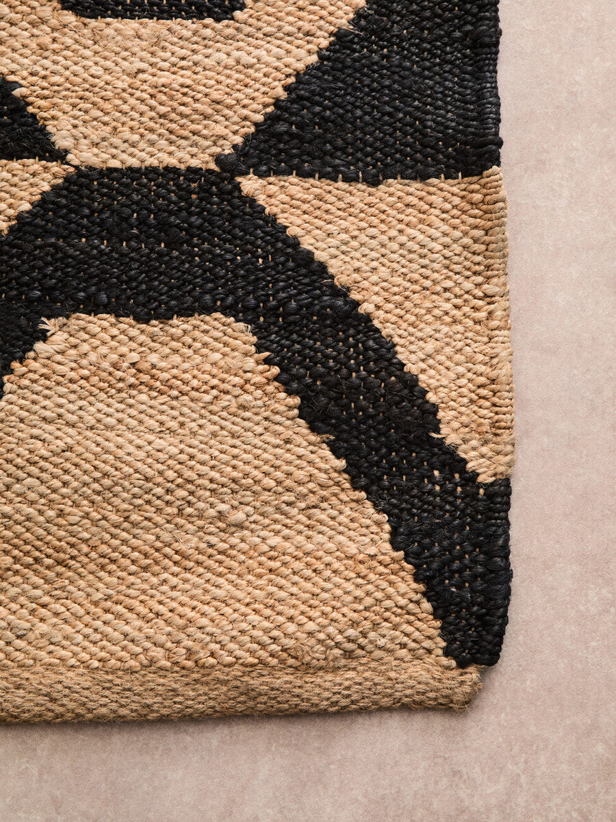 Orsina Hemp Rug featuring a modern design with natural tones and geometric patterns