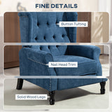 Vintage Armchair with button tufting, nail head trim, and solid wood legs for a classic touch