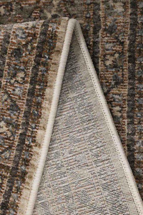 Close-up of a Vintage Rug showcasing intricate patterns and a textured underside