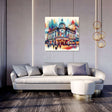Vibrant Wall Art Canvas depicting a colourful city scene above a modern sofa in a stylish interior