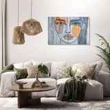Stylish Wall Art Canvas featuring a modern abstract face design in a chic living room setting