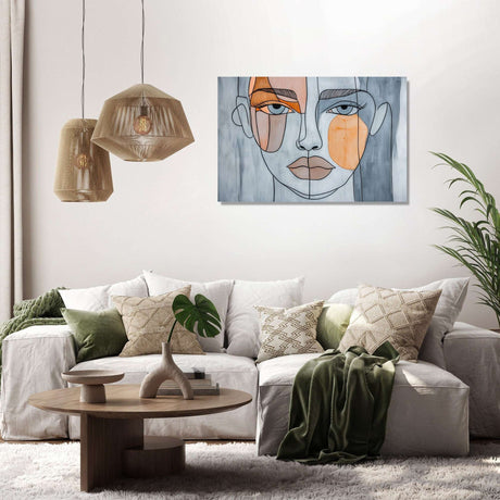 Stylish Wall Art Canvas featuring a modern abstract face design in a chic living room setting