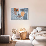 Stylish wall art canvas featuring a modern abstract face design in a chic bedroom setting