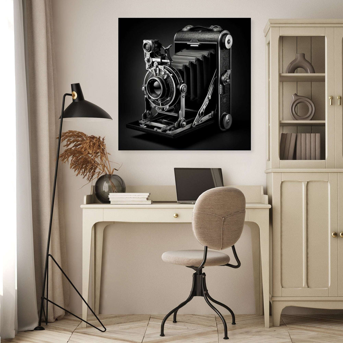 Vintage camera Wall Art Canvas displayed above a modern desk in a stylish office setting