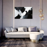 Abstract Wall Art Canvas featuring bold black and white brush strokes in a modern living room setting