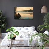 Serene Wall Art Canvas featuring a fisherman at sunrise over tranquil waters in a stylish bedroom setting