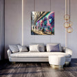 Vibrant Wall Art Canvas featuring street art in an urban setting above a modern sofa