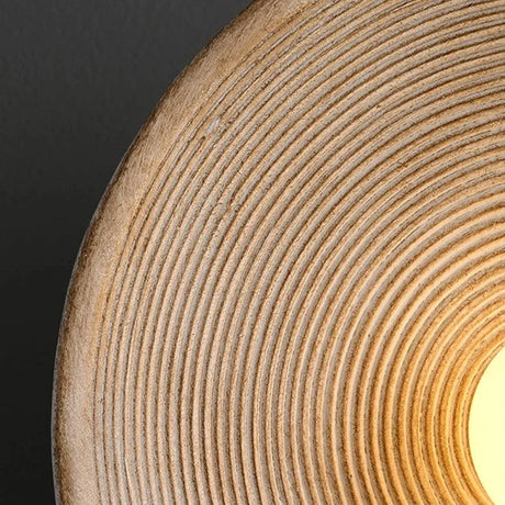 Stylish Wall Lamp by Light My House featuring a textured design and warm lighting