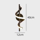 Stylish Light My House Wall Light with a modern spiral design, 40cm tall and 12cm wide