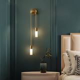 Stylish gold wall light with glass bulb, perfect for modern home decor and ambient lighting
