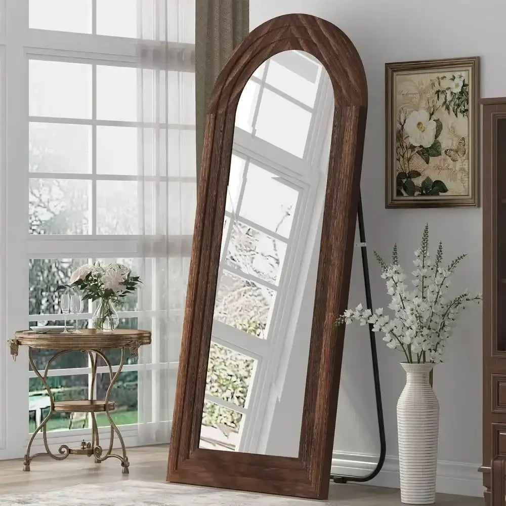 Nisu Home Wall Mirror in a wooden frame, perfect for enhancing natural light in any room