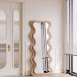 Nisu Home Wall Mirror with a unique wavy frame, ideal for modern home decor