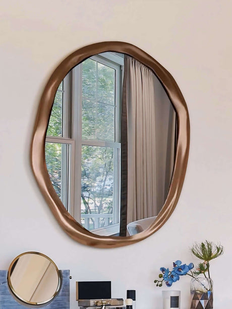 Stylish Nisu Home Wall Mirror with an Organic Shape and Elegant Bronze Finish