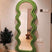 Unique Green Wall Mirror with Wavy Frame Design, Perfect for Modern Home Decor