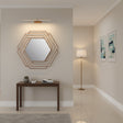 Orsina Wall Mirror in an elegant hexagonal design above a console table in a stylish interior