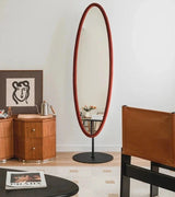 Stylish Nisu Home Wall Mirror with a unique red frame, perfect for modern home decor