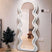 Stylish Nisu Home Wall Mirror with unique wavy design, perfect for modern interior decor
