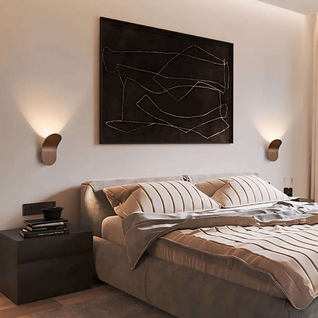 Elegant Nisu Home Wall Sconce lights illuminating a stylish bedroom with modern decor