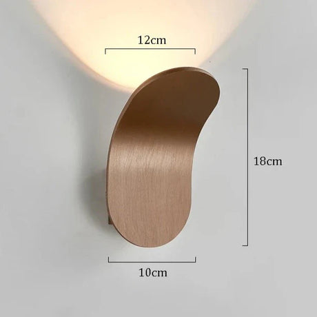Nisu Home Wall Sconce in modern design with soft light and sleek bronze finish for elegant decor
