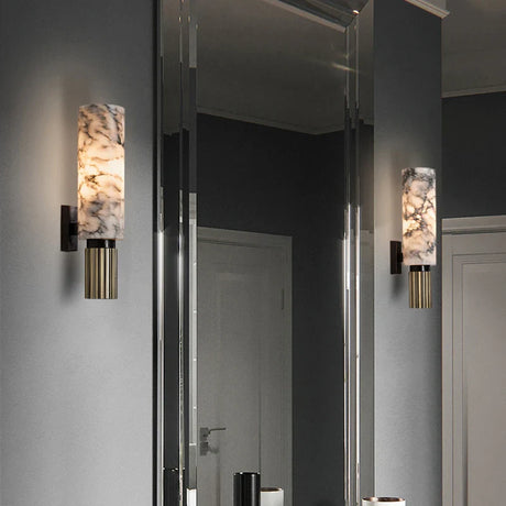 Elegant Nisu Home Wall Sconce featuring a marble design and warm ambient lighting for modern interiors