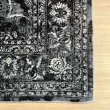 Elegant black and grey patterned washable rug with intricate floral designs for versatile decor