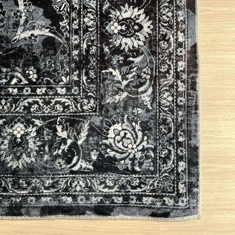 Elegant black and grey patterned washable rug with intricate floral designs for versatile decor