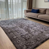 Elegant grey patterned washable rug enhancing the living room decor with a soft texture