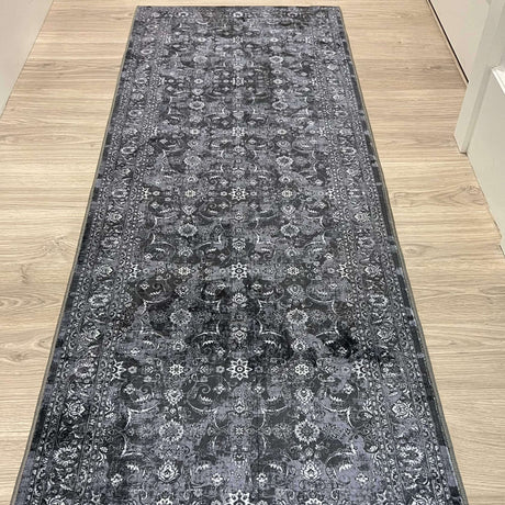 Elegant grey washable rug with intricate floral patterns, perfect for enhancing floor decor