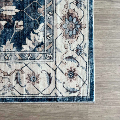 Elegant washable rug with intricate floral patterns in blue and beige tones for stylish home decor