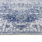 Elegant blue and white patterned washable rug featuring intricate designs for versatile home decor