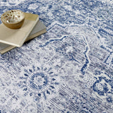 Stylish washable rug in blue and white patterns, perfect for modern home decor