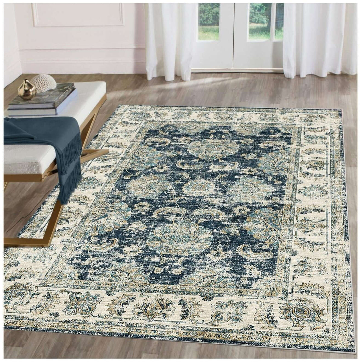 Elegant washable rug with a traditional floral pattern in navy and cream for stylish home decor