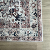 Vintage-style Washable Rug with intricate patterns in red, black, and cream colours