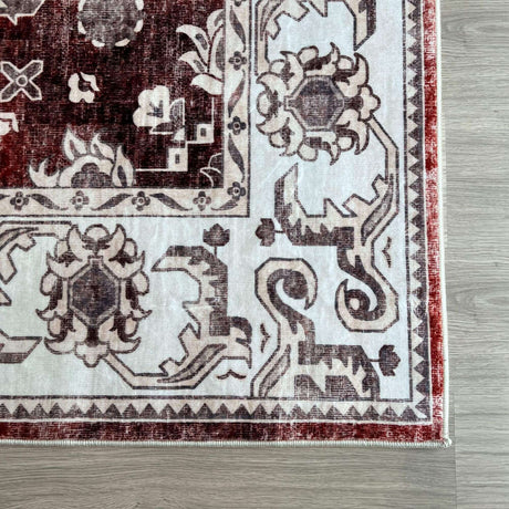 Elegant red and beige vintage-style washable rug with intricate patterns for home decor