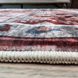 Close-up of a soft, textured washable rug with intricate patterns and edge detailing