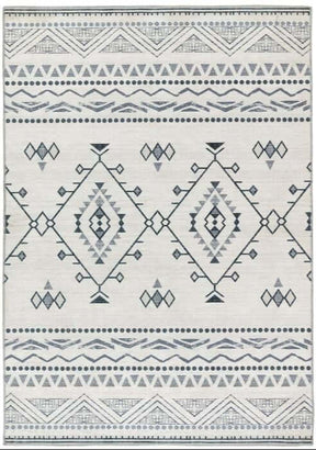 Stylish washable rug featuring geometric patterns in shades of grey and cream for modern interiors