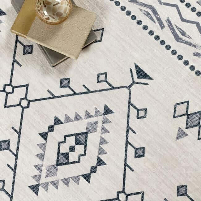 Stylish washable rug featuring geometric patterns in monochrome shades, perfect for modern interiors