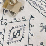Stylish washable rug featuring geometric patterns in monochrome shades, perfect for modern interiors