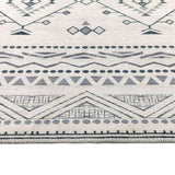 Stylish washable rug featuring geometric patterns in a neutral colour palette, perfect for modern interiors