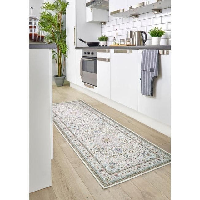 Elegant washable rug in a kitchen setting, featuring a floral pattern and durable construction