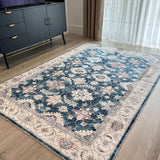 Elegant washable rug with intricate floral patterns in blue and beige for home decor