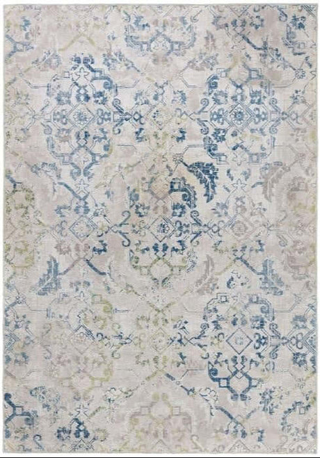 Elegant washable rug with intricate blue and green floral patterns on a light background