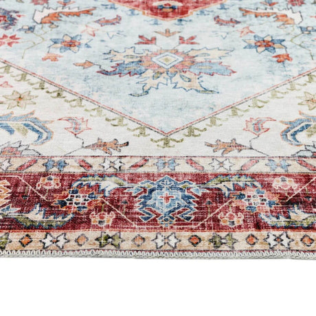 Vintage-style washable rug with intricate patterns and soft pastel colours for home decor